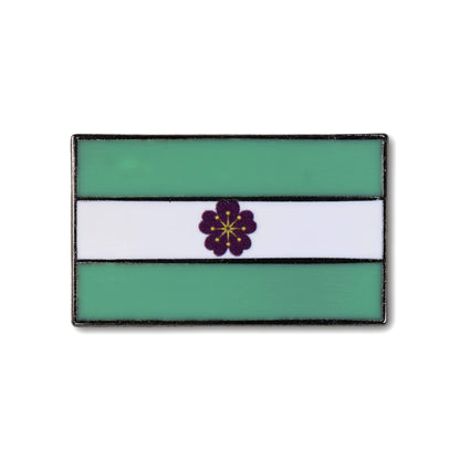 Rectangular flag with green and white stripes and a purple flower in the center on a white background