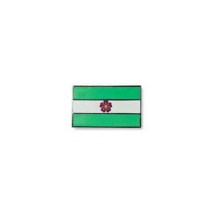 Rectangular Diamoric lapel pin featuring three horizontal stripes green, white, and green with a small purple flower at the centre.