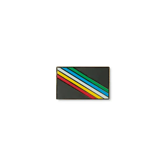 Disability lapel pin with a black background and five diagonal stripes in red, yellow, white, blue, and green, symbolising disability pride, diversity.