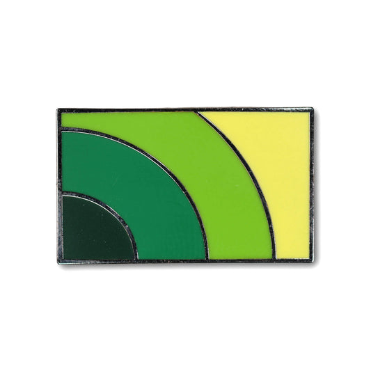 Rectangular pin with green and yellow design on a white background