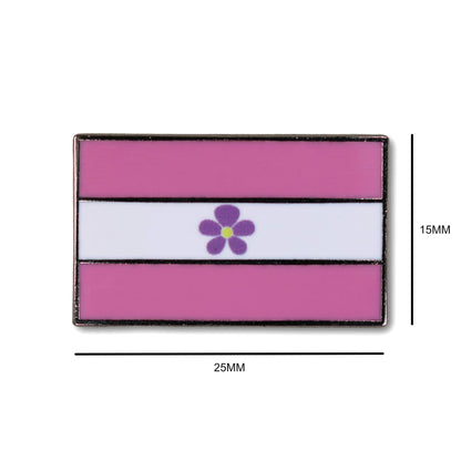 Flag-shaped badge with a flower design on a white background